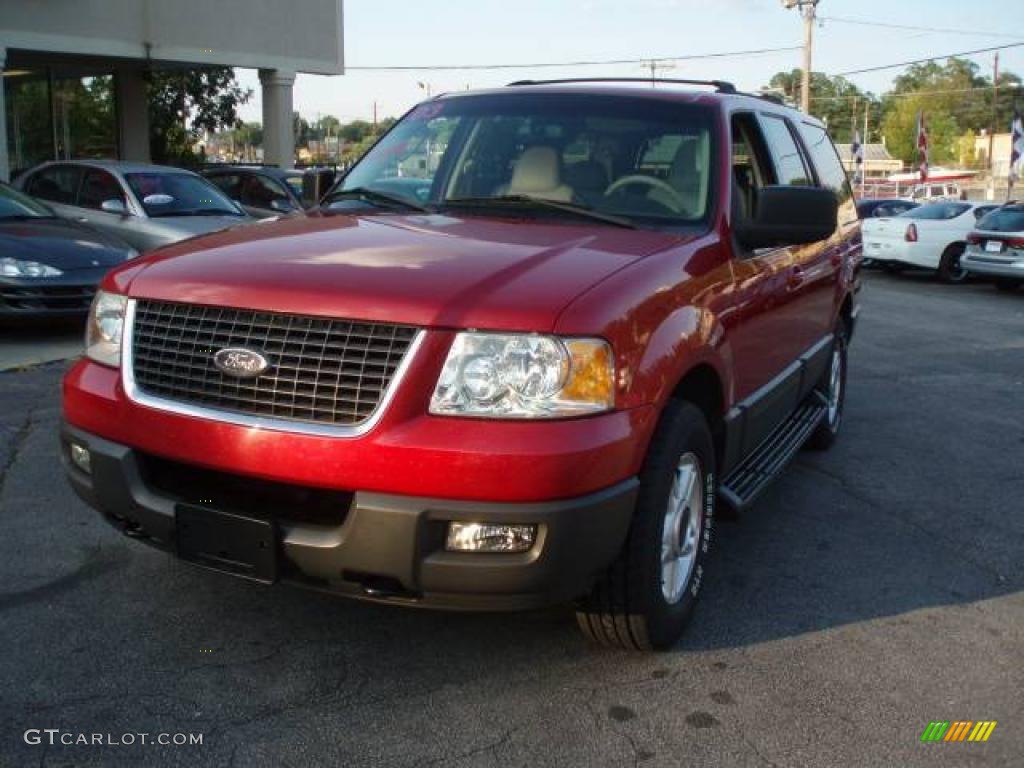 2003 Expedition XLT 4x4 - Laser Red Tinted Metallic / Medium Parchment photo #2