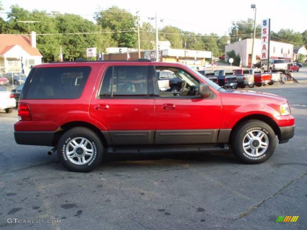 2003 Expedition XLT 4x4 - Laser Red Tinted Metallic / Medium Parchment photo #5