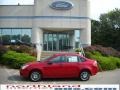 2010 Sangria Red Metallic Ford Focus SE Sedan  photo #1