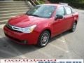 2010 Sangria Red Metallic Ford Focus SE Sedan  photo #2