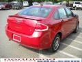 2010 Sangria Red Metallic Ford Focus SE Sedan  photo #6