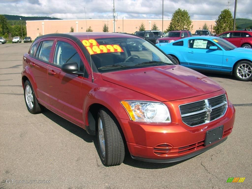 2009 Caliber SXT - Sunburst Orange Pearl / Dark Slate Gray photo #3