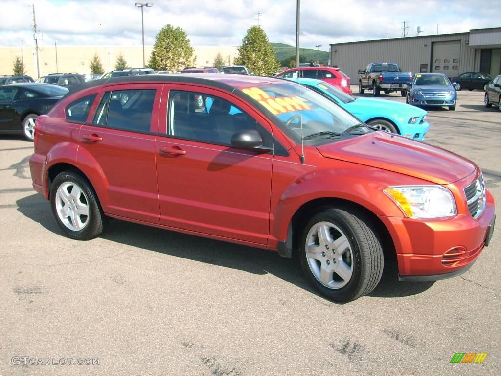 2009 Caliber SXT - Sunburst Orange Pearl / Dark Slate Gray photo #4