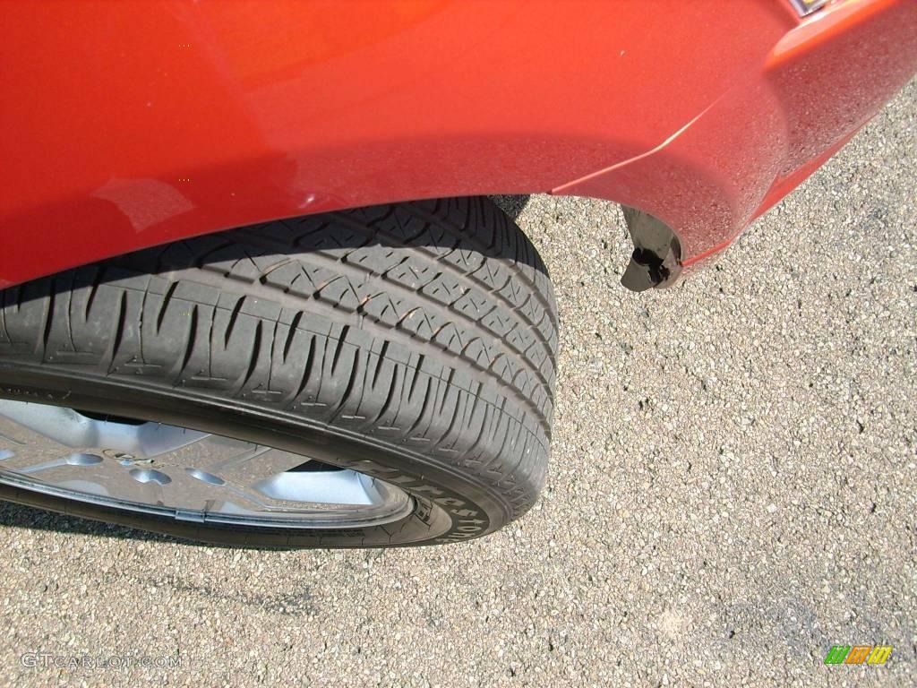 2009 Caliber SXT - Sunburst Orange Pearl / Dark Slate Gray photo #6