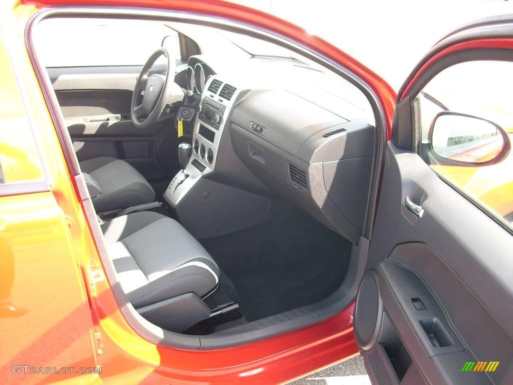 2009 Caliber SXT - Sunburst Orange Pearl / Dark Slate Gray photo #7