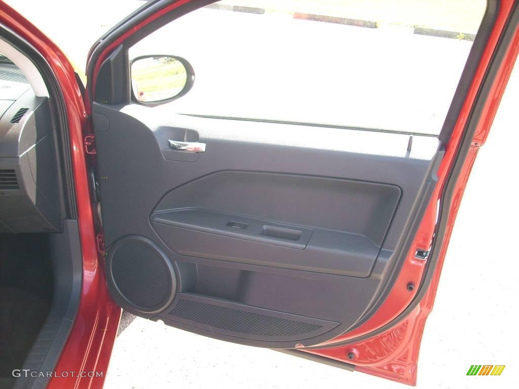 2009 Caliber SXT - Sunburst Orange Pearl / Dark Slate Gray photo #8