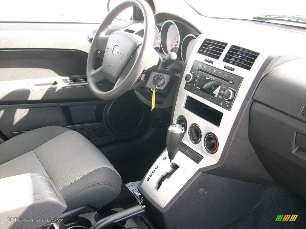 2009 Caliber SXT - Sunburst Orange Pearl / Dark Slate Gray photo #9