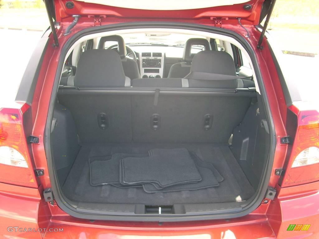 2009 Caliber SXT - Sunburst Orange Pearl / Dark Slate Gray photo #17