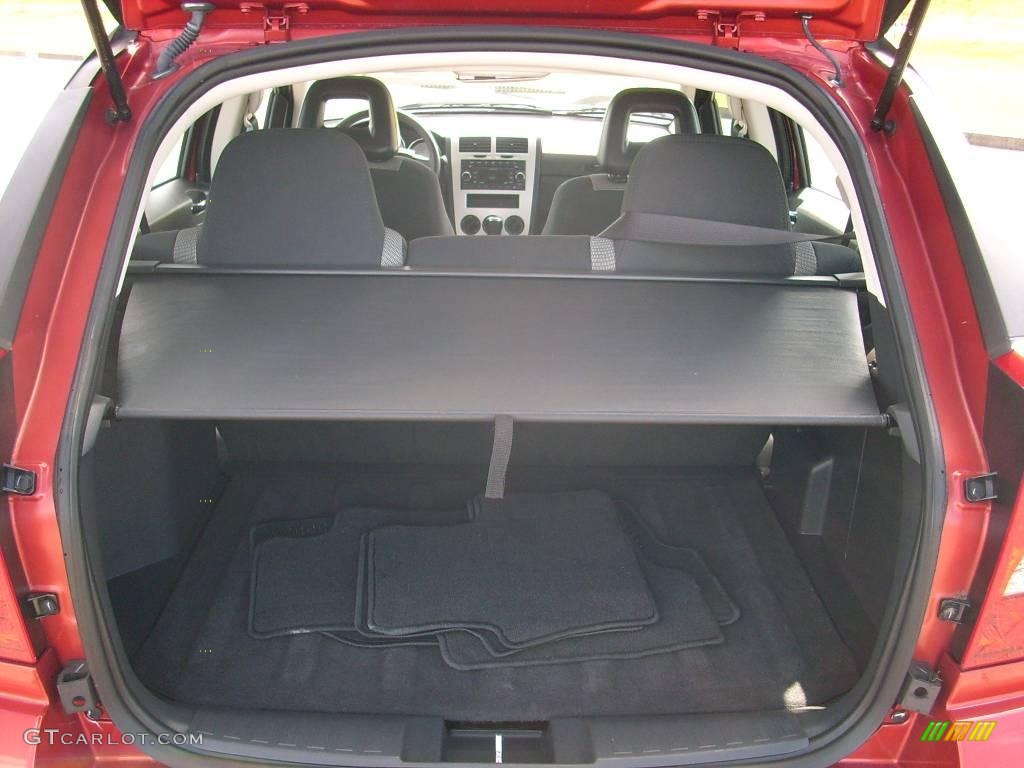 2009 Caliber SXT - Sunburst Orange Pearl / Dark Slate Gray photo #18