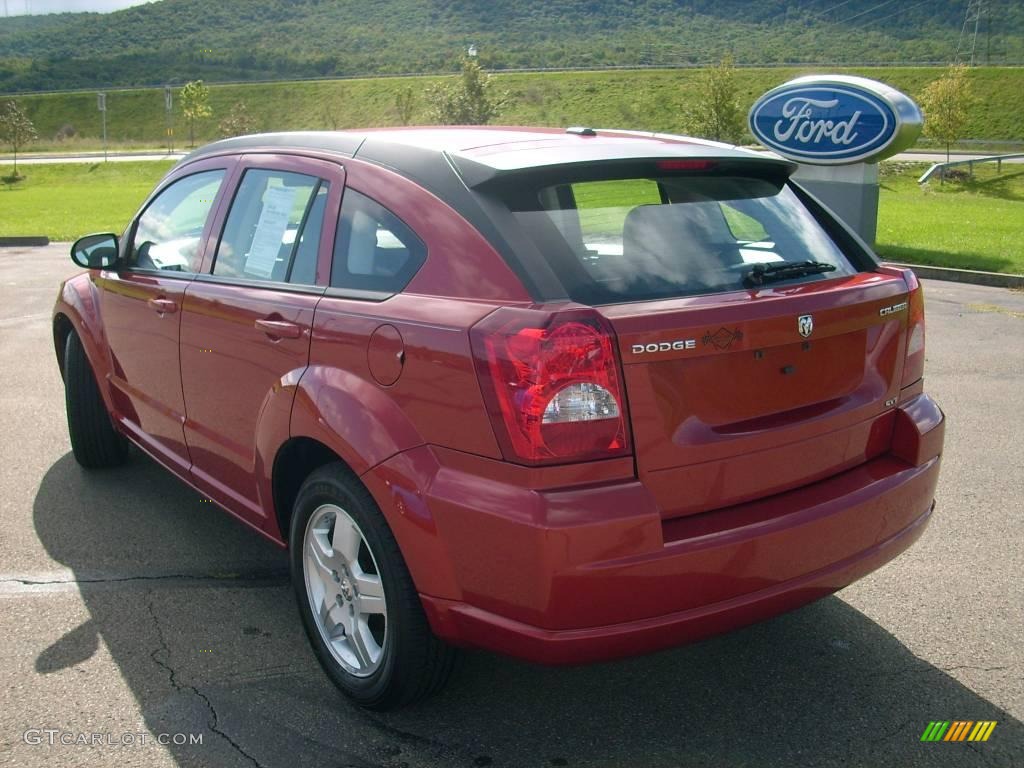 2009 Caliber SXT - Sunburst Orange Pearl / Dark Slate Gray photo #20