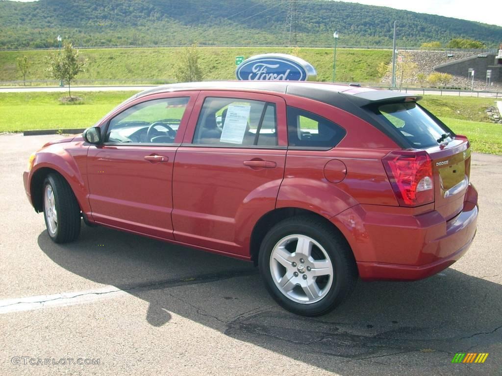 2009 Caliber SXT - Sunburst Orange Pearl / Dark Slate Gray photo #21