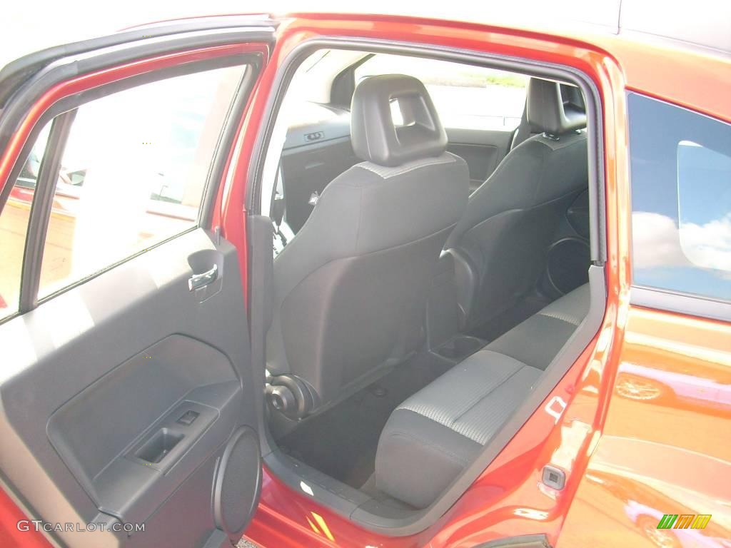 2009 Caliber SXT - Sunburst Orange Pearl / Dark Slate Gray photo #22