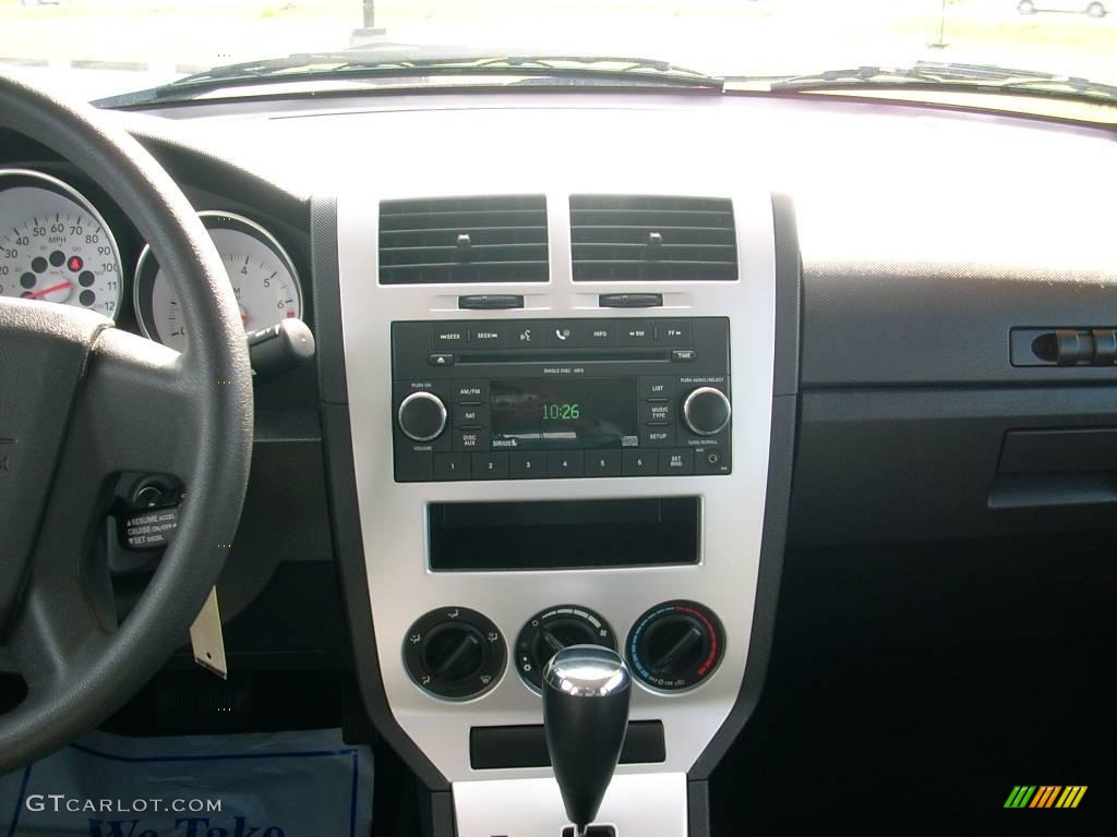 2009 Caliber SXT - Sunburst Orange Pearl / Dark Slate Gray photo #27