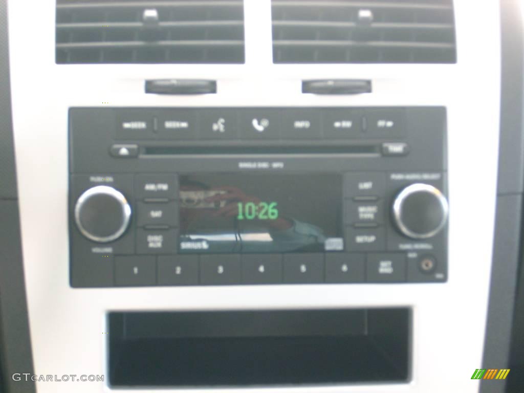 2009 Caliber SXT - Sunburst Orange Pearl / Dark Slate Gray photo #28