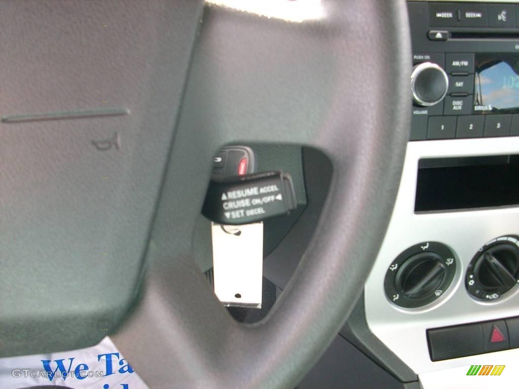 2009 Caliber SXT - Sunburst Orange Pearl / Dark Slate Gray photo #30