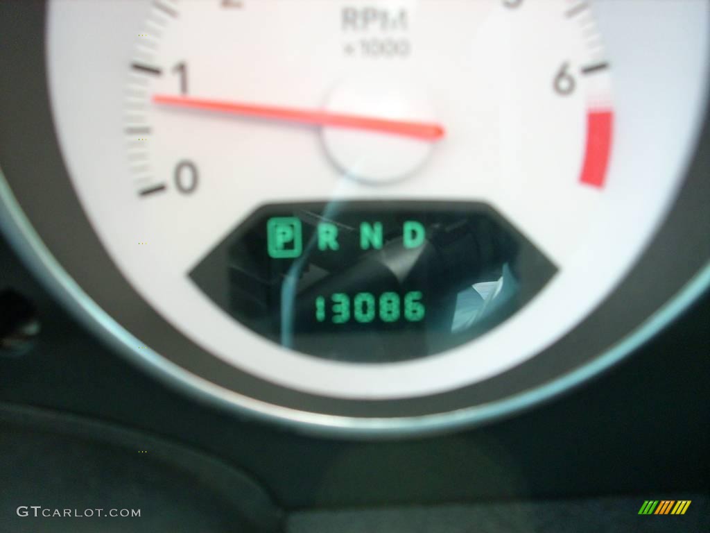 2009 Caliber SXT - Sunburst Orange Pearl / Dark Slate Gray photo #31