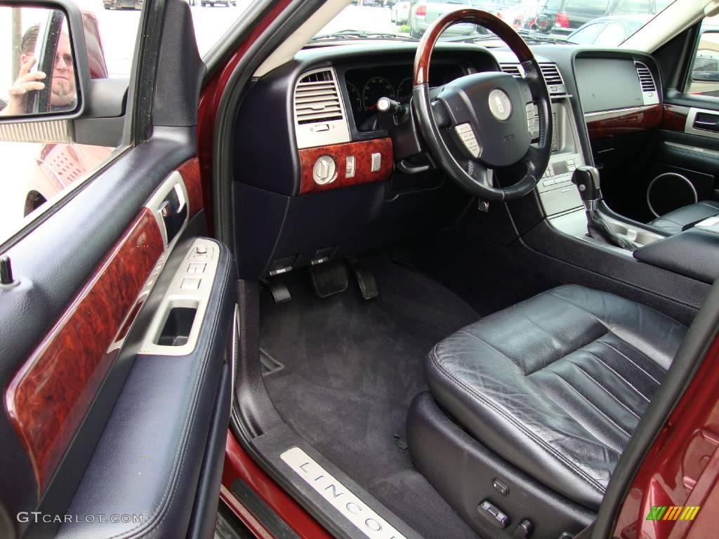 2003 Navigator Luxury 4x4 - Autumn Red Metallic / Black photo #12