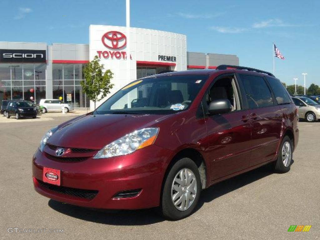 2009 Sienna LE - Salsa Red Pearl / Taupe photo #1