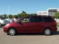 2009 Salsa Red Pearl Toyota Sienna LE  photo #2