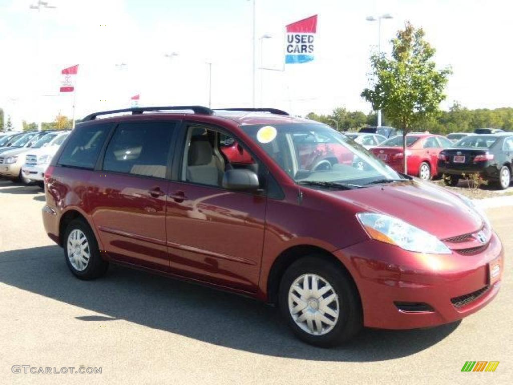 2009 Sienna LE - Salsa Red Pearl / Taupe photo #7