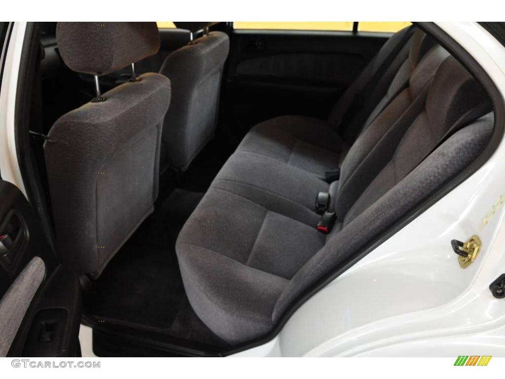 1995 Maxima GXE - Arctic White Pearl / Black photo #17