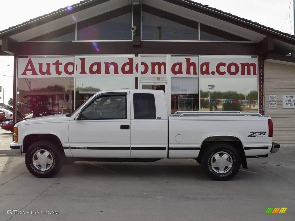 1996 C/K K1500 Silverado Extended Cab 4x4 - Olympic White / Red photo #1