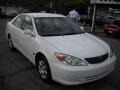 2004 Super White Toyota Camry LE  photo #19