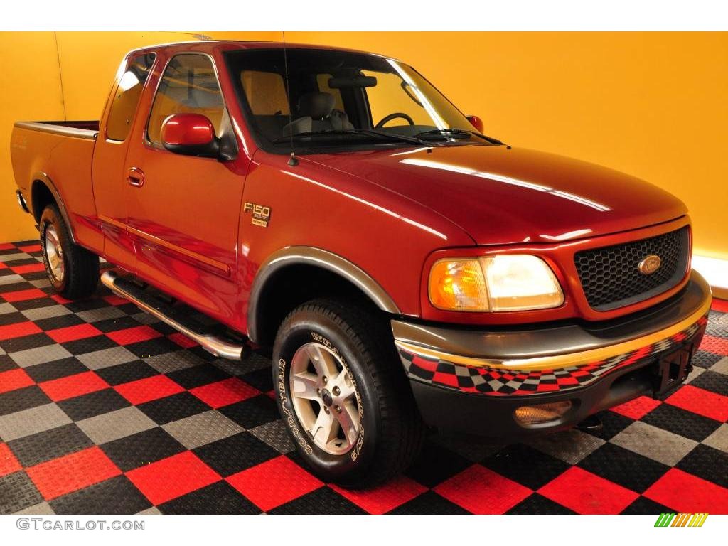2002 F150 XLT SuperCab 4x4 - Toreador Red Metallic / Medium Graphite photo #1