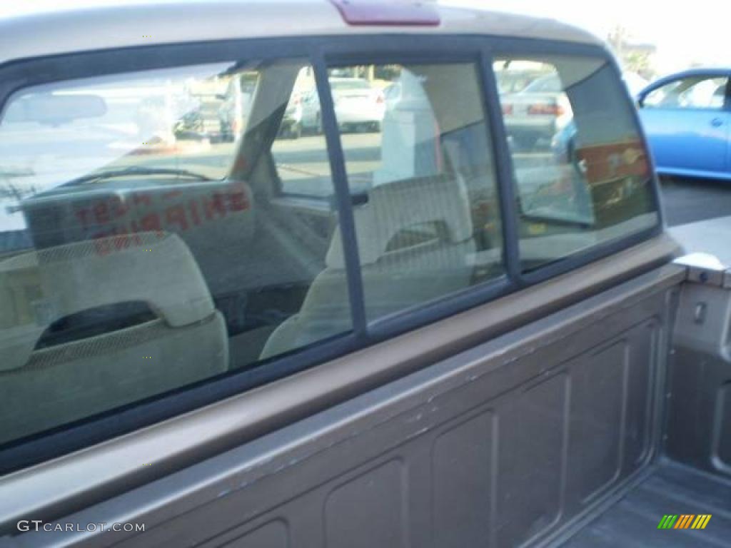 1997 S10 LS Extended Cab - Light Autumnwood Metallic / Beige photo #12