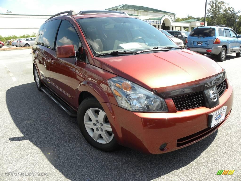 Autumn Red Metallic Nissan Quest