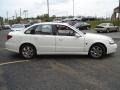 Cream White - L Series L300 Sedan Photo No. 6