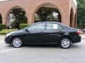 2009 Black Sand Pearl Toyota Corolla LE  photo #18