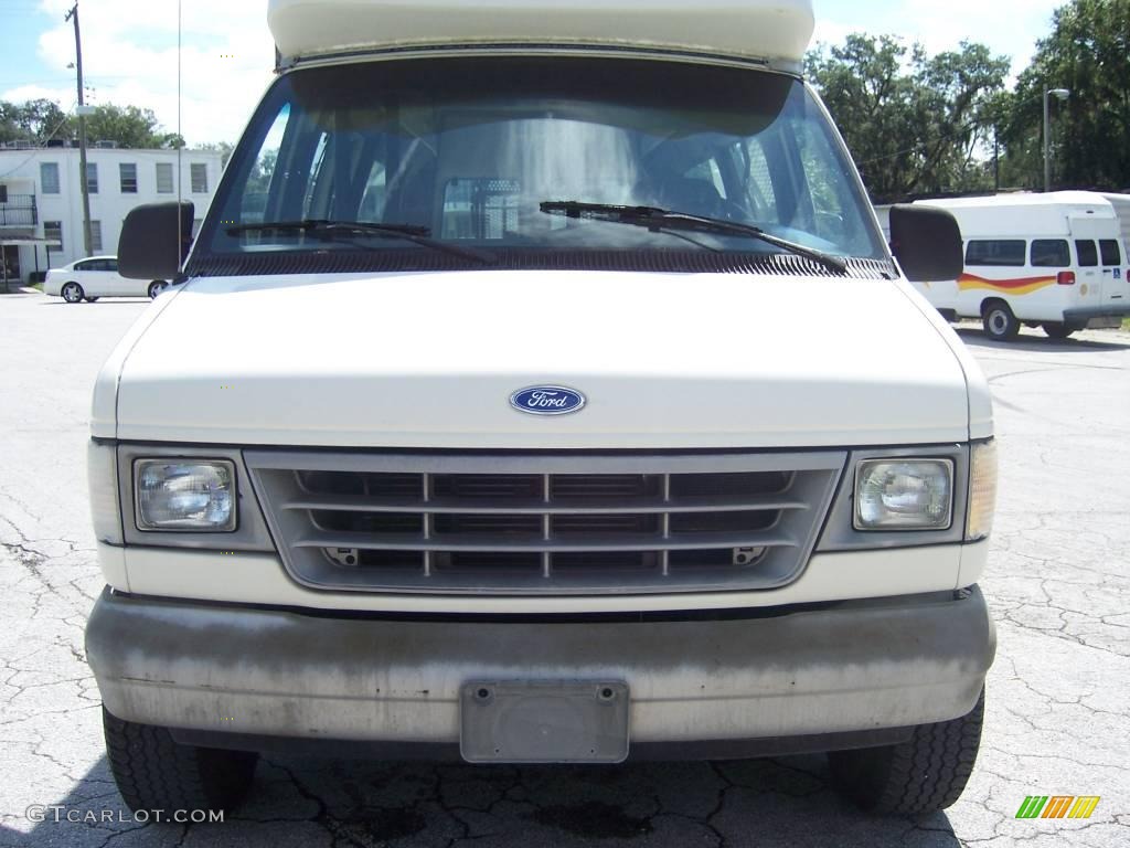 White Ford E Series Van