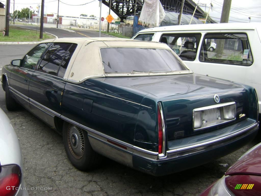 1995 Dark Calypso Green Metallic Cadillac Deville Sedan