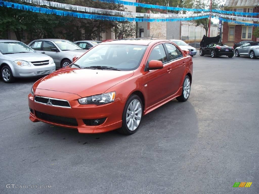 2010 Lancer GTS - Rotor Glow Orange Metallic / Black photo #1