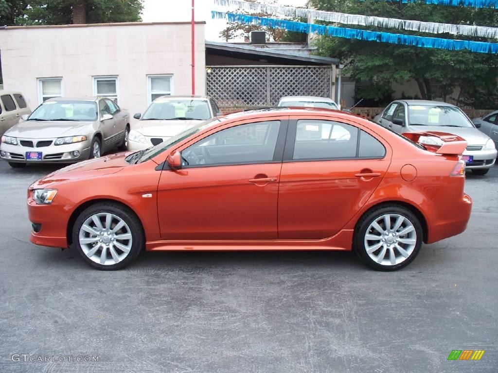 2010 Lancer GTS - Rotor Glow Orange Metallic / Black photo #2