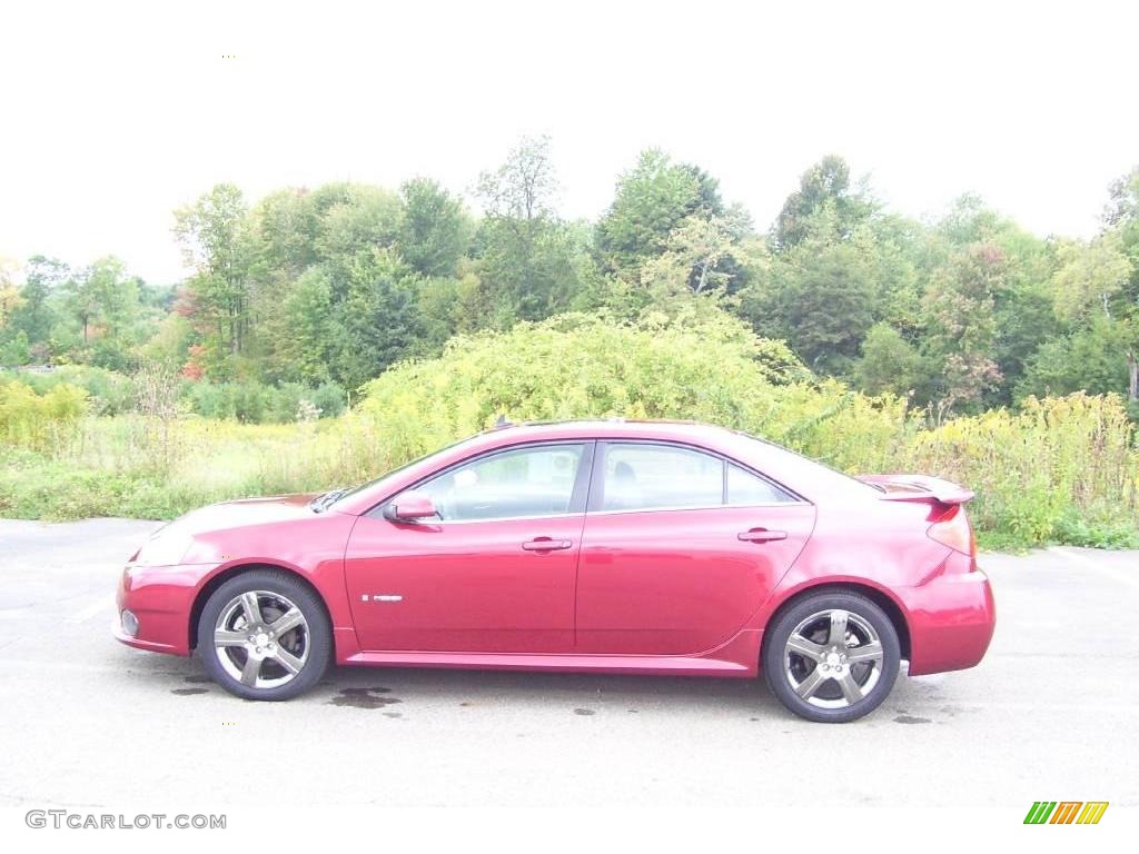 2009 G6 GXP Sedan - Performance Red Metallic / Ebony photo #1