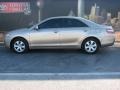 2008 Desert Sand Mica Toyota Camry LE  photo #1