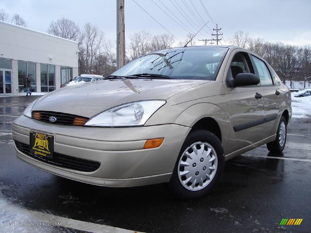 2002 Focus LX Sedan - Fort Knox Gold / Medium Graphite photo #1