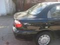 1999 Black Kia Sephia LS  photo #14