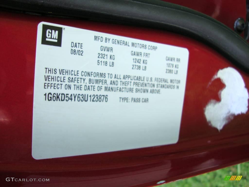 2003 DeVille Sedan - Crimson Red Pearl / Neutral Shale Beige photo #34