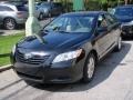 2009 Black Toyota Camry LE  photo #1