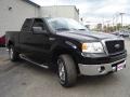 2006 Black Ford F150 XLT SuperCab 4x4  photo #7