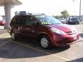 2009 Salsa Red Pearl Toyota Sienna LE  photo #3