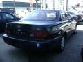 Dark Emerald Green Metallic - Camry LE Sedan Photo No. 4