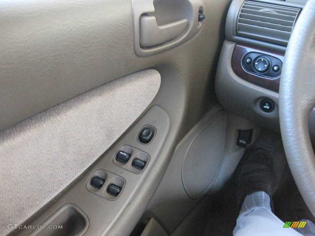 2002 Sebring LX Sedan - Light Almond Pearl Metallic / Sandstone photo #16
