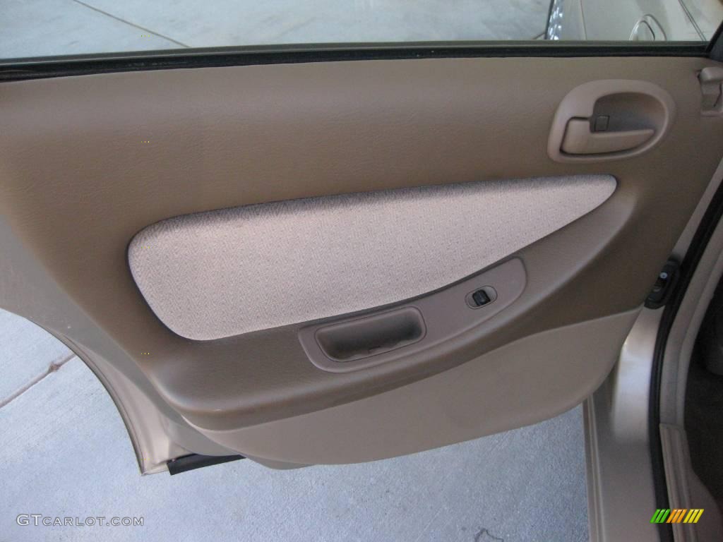 2002 Chrysler Sebring LX Sedan Sandstone Door Panel Photo #18866644