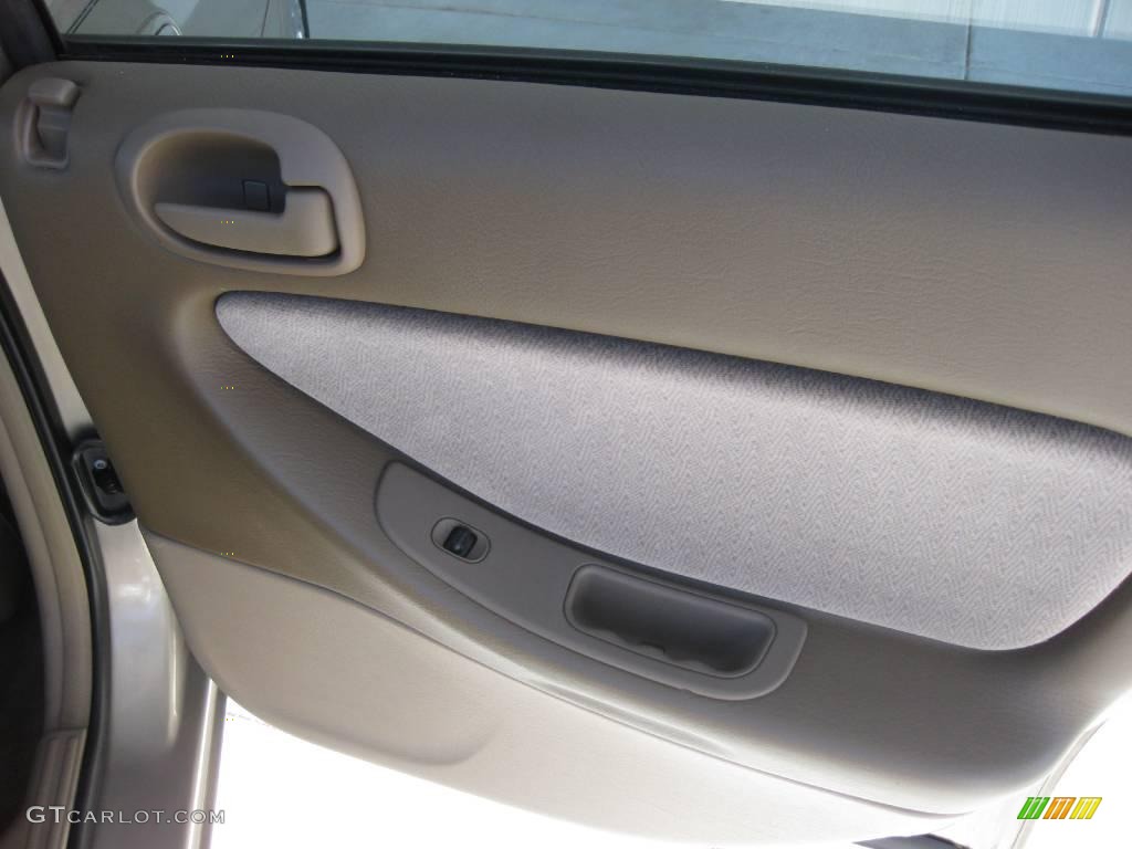 2002 Chrysler Sebring LX Sedan Sandstone Door Panel Photo #18866656