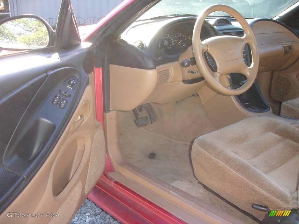 1995 Mustang V6 Coupe - Laser Red Metallic / Saddle photo #9