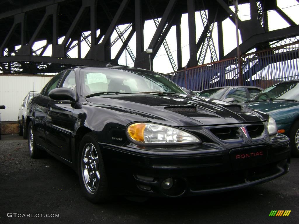 2003 Grand Am GT Sedan - Black / Dark Pewter photo #1